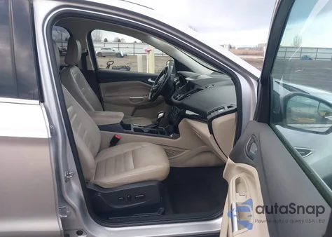 2019 Ford Escape Titanium z USA, uszkodzony, nr VIN 1FMCU9J90KUB29009
